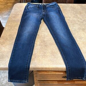 Women’s KanCan  skinny jeans, size 27 inseam measures about 29”